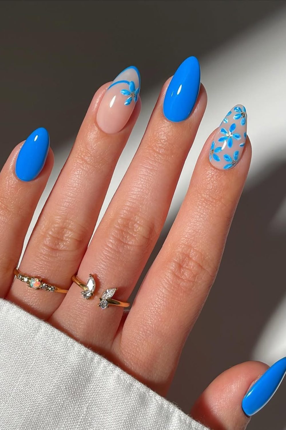 Bold Blue Floral Nails – Vibrant and Elegant