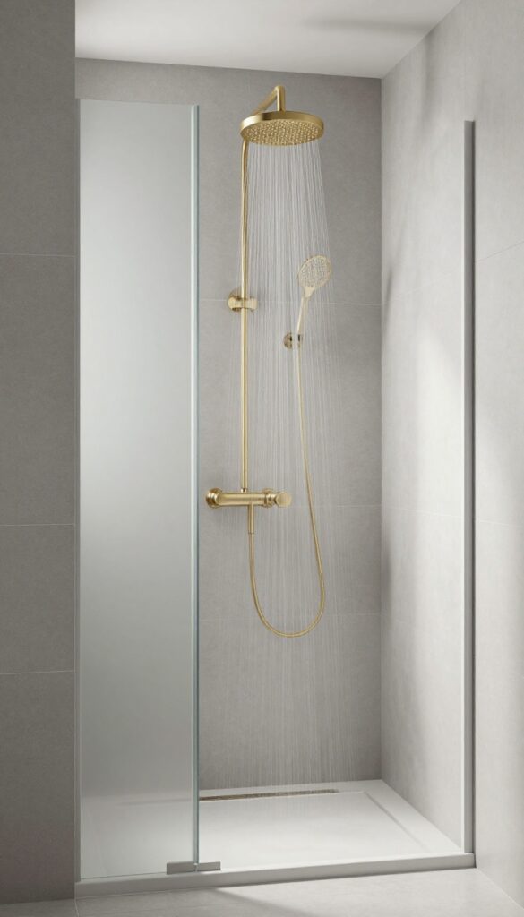 Soft gray tiled shower with brass fixtures