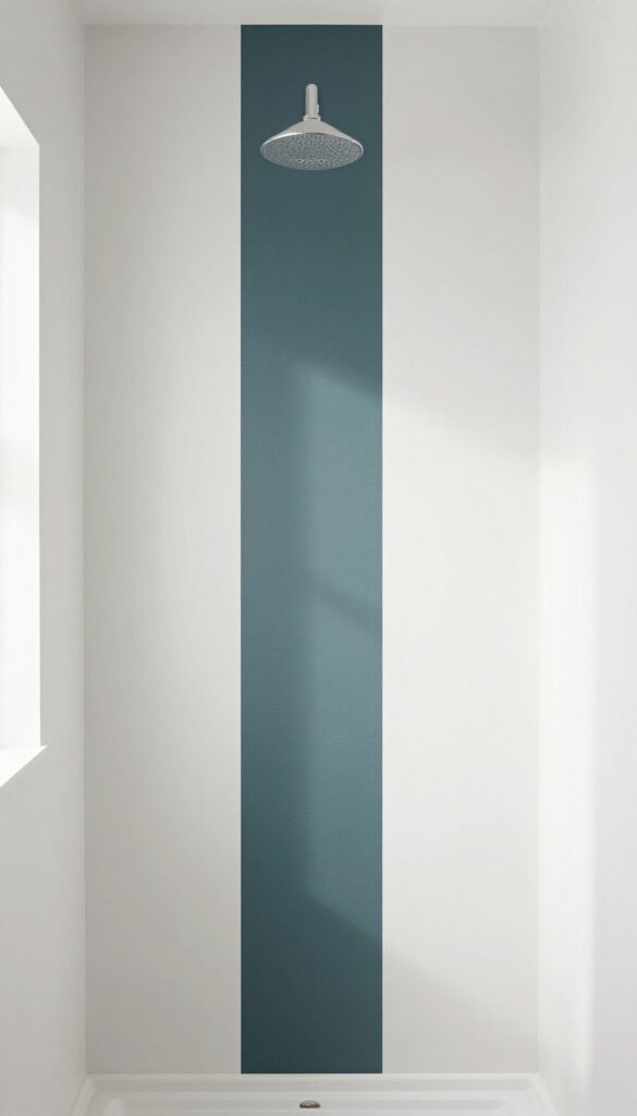 A bathroom with a shower area showing a bold paint or wallpaper strip on the wall above it to add visual interest and finish the space beautifully.