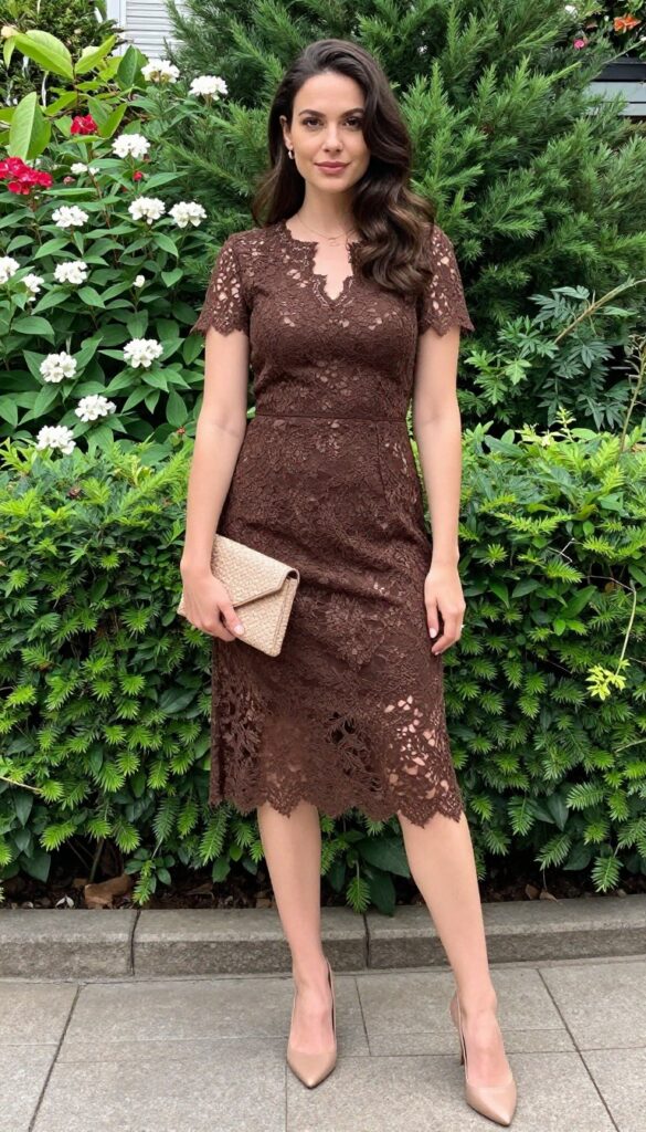 Woman in brown lace midi dress and nude pumps at garden wedding