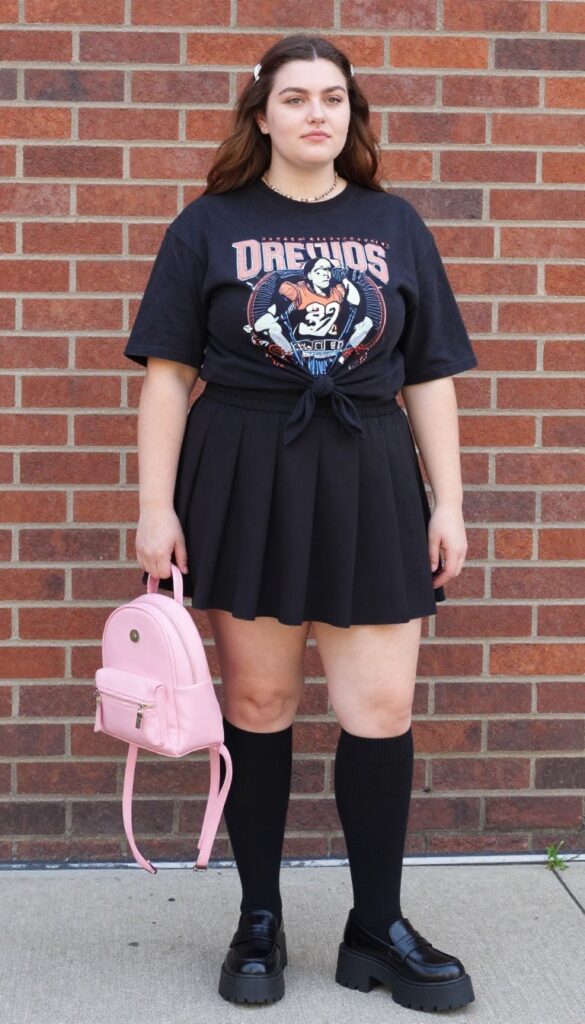6. Graphic Tee with a Pleated Mini Skirt