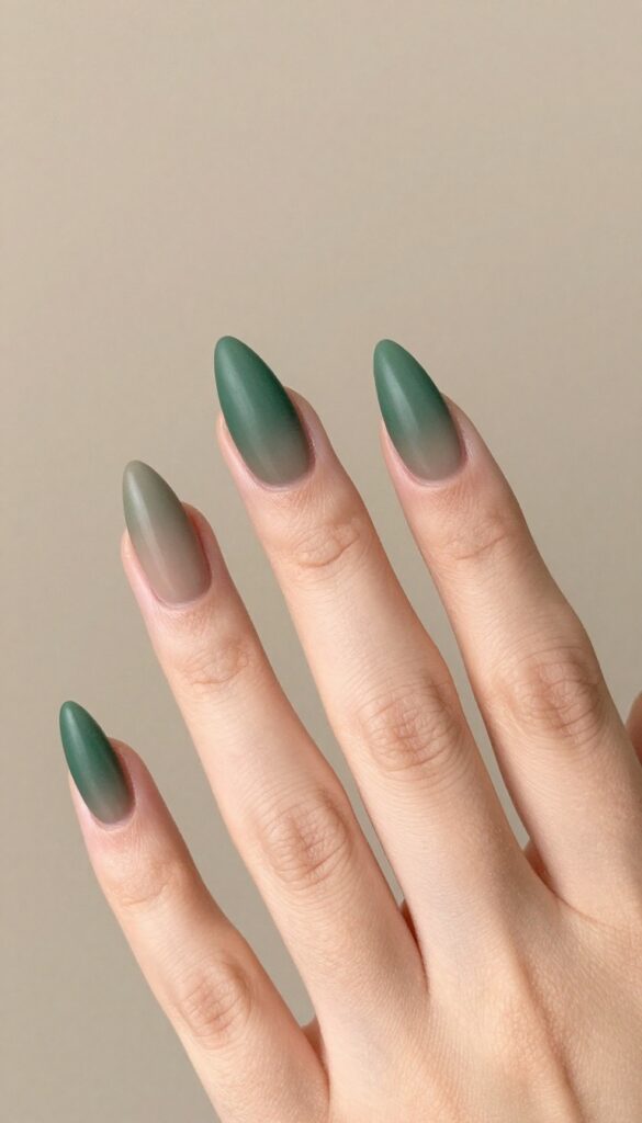 Mossy ombré stiletto nails with deep green fading to taupe