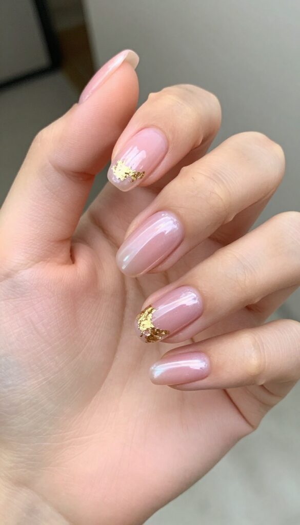 Pearlescent almond nails with gold foil accents for fall wedding