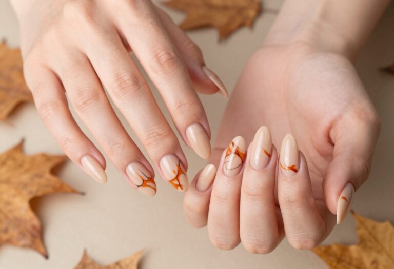 Burnt orange marble swirl acrylic nails for fall
