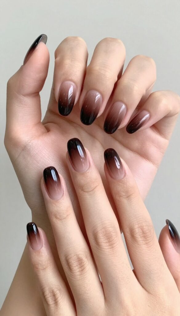 Chocolate cherry ombré nails on almond shape with glossy finish