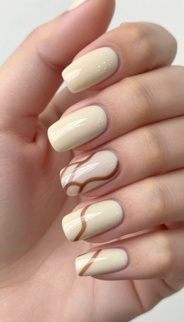 Almond nails with mocha swirl design