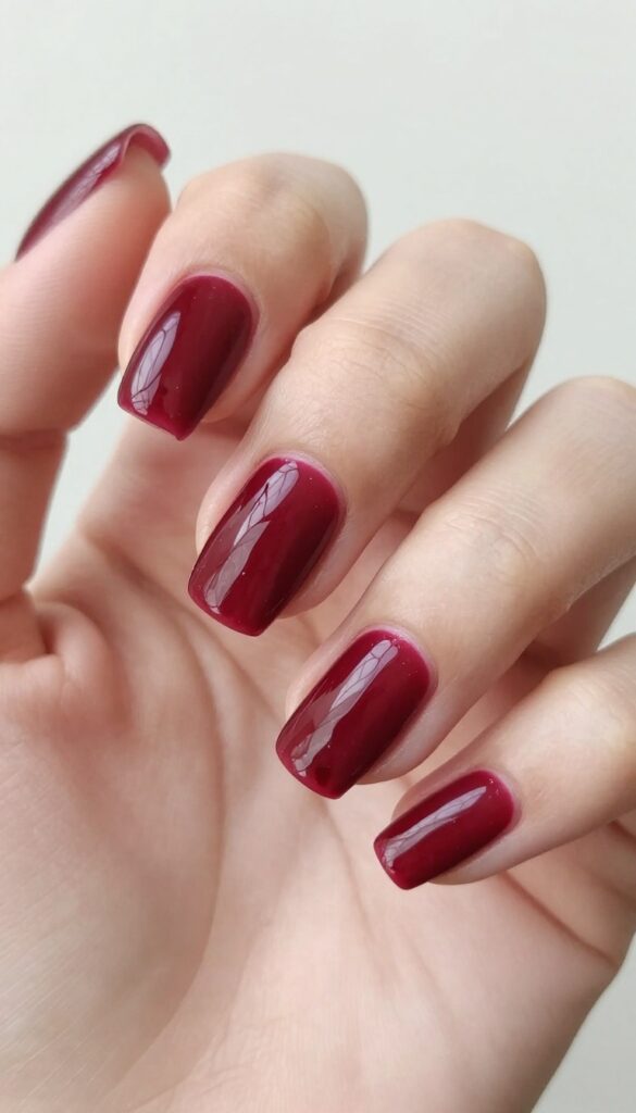 Blood drip French tip nails with sheer nude base and crimson red drips