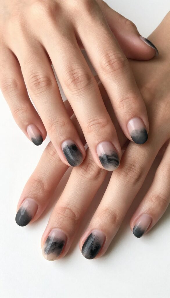 Charcoal smudge nails with matte finish and black smudges