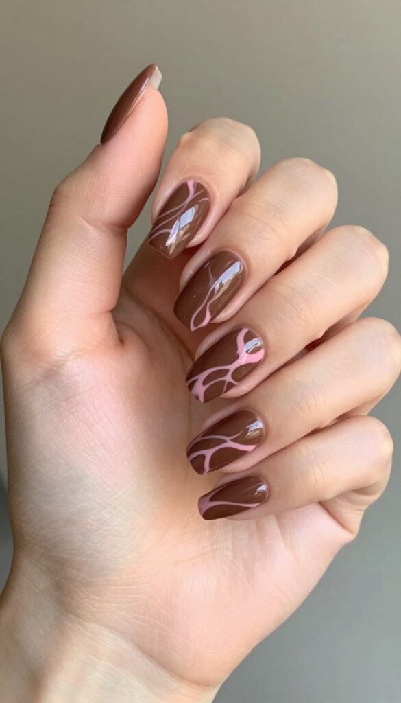 Chocolate berry swirl almond nails with glossy finish