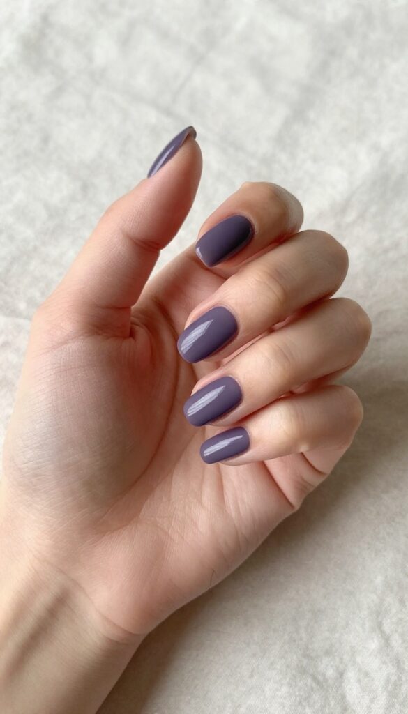 Short almond nails in smoky amethyst with matte finish