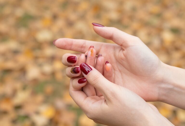 Fall nail color ideas with cranberry, merlot, chocolate cherry swirl, and maple syrup glaze manicure