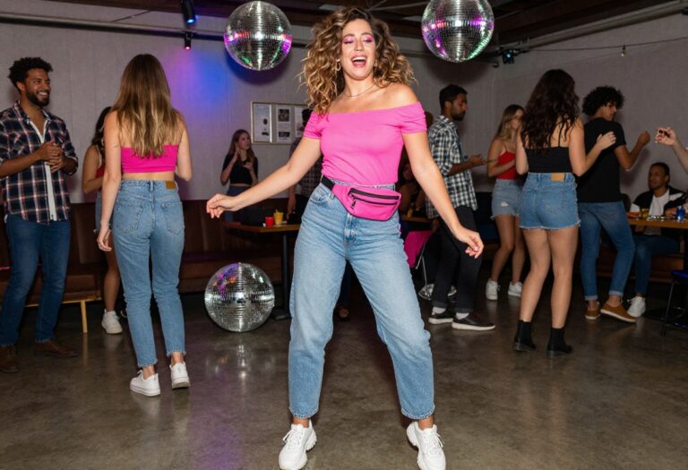 Woman in a neon 80s outfit dancing at a retro party
